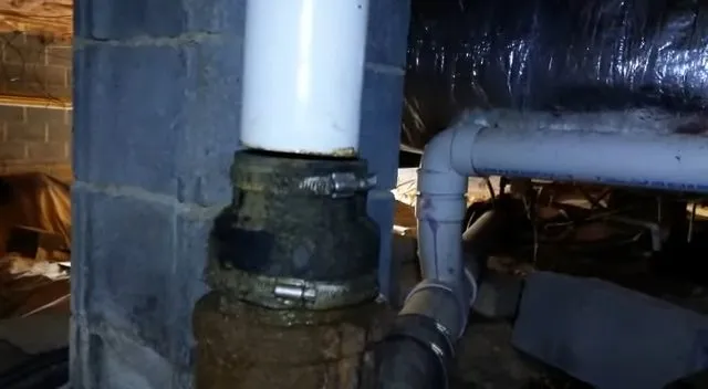 New PVC stack joined to an old crawlspace drain