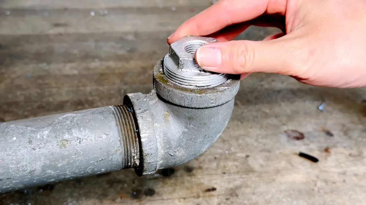 Removing a stuck cast-iron cleanout cap