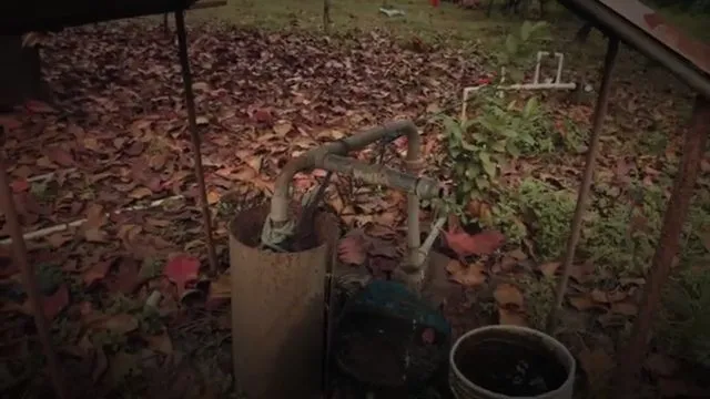 Repairing a buried water line with a compression coupling