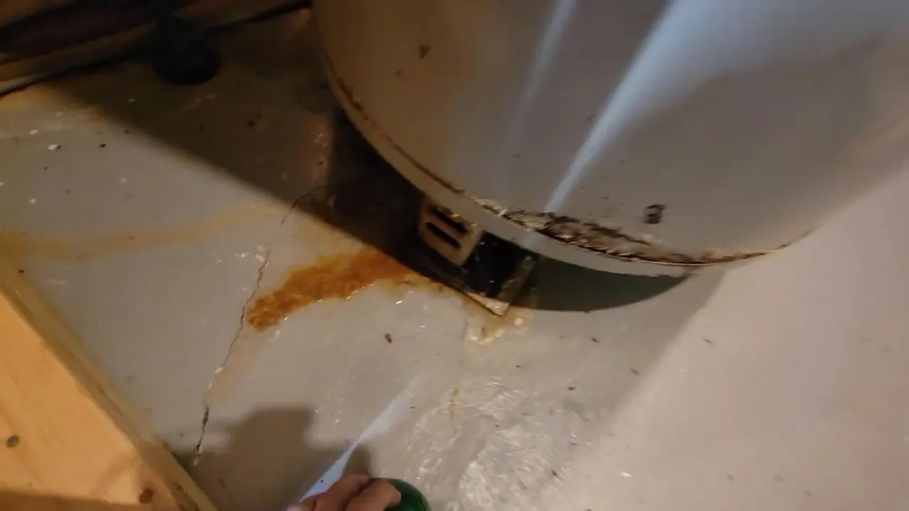 Rust stain below an old water heater