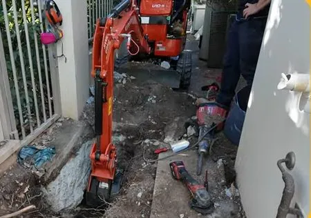 Sewer pipe access opened for grease cleaning