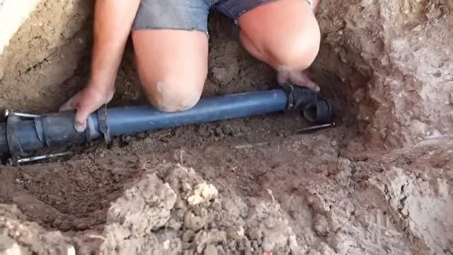 Sliding a repair coupling onto a water line