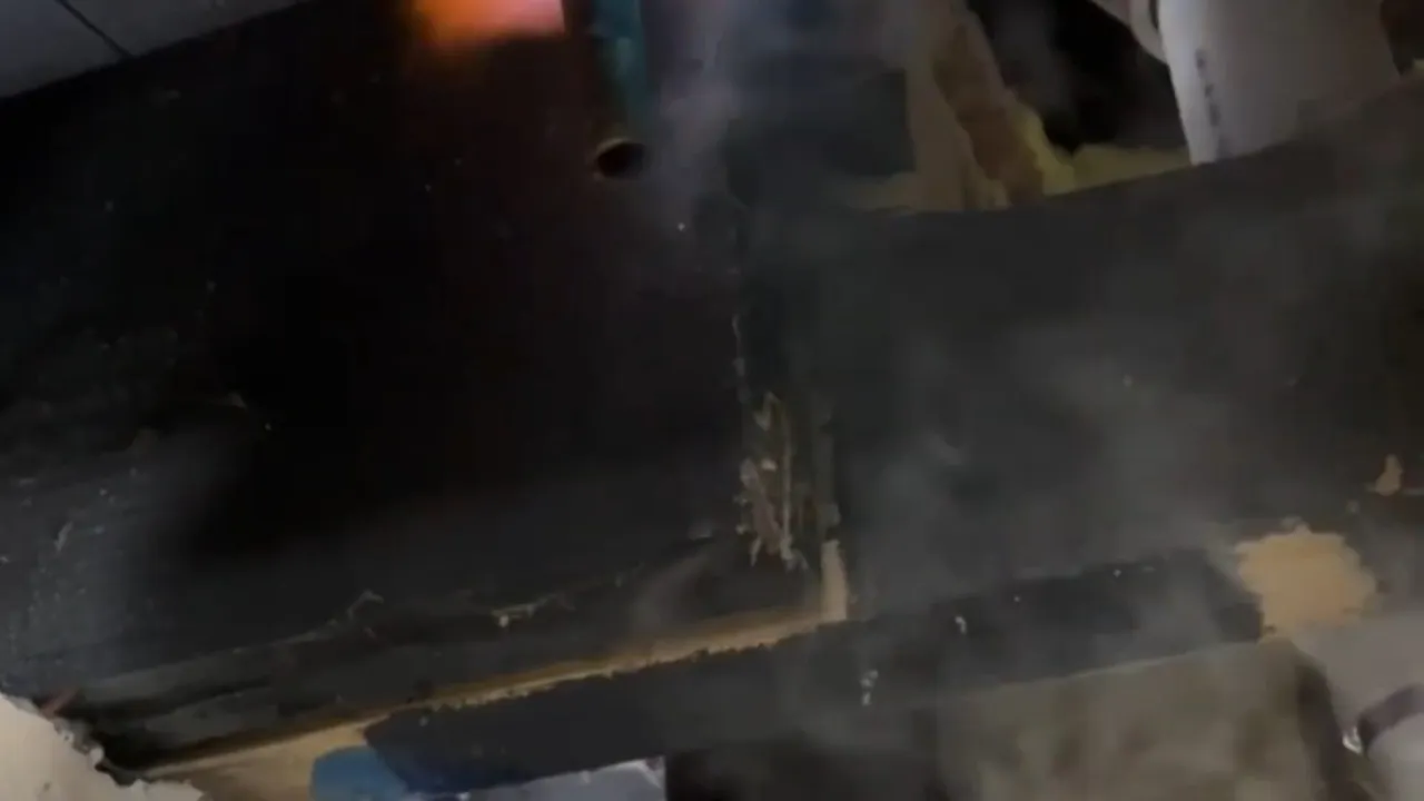 Water line thawing device beneath a floor